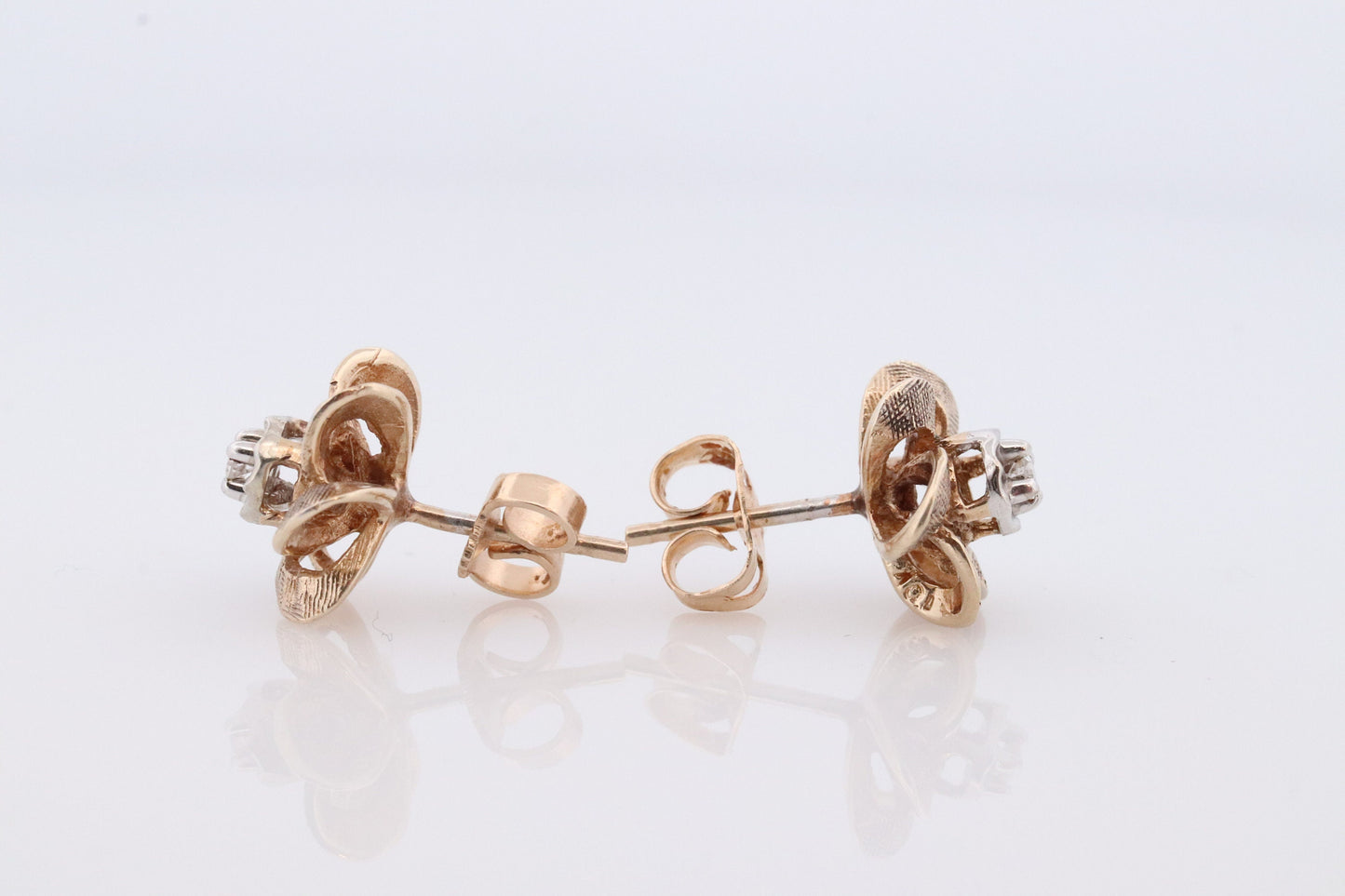 10k Diamond Flower or Star stud earrings. Flower Diamond Solitaire earrings. Propeller Flower Studs.