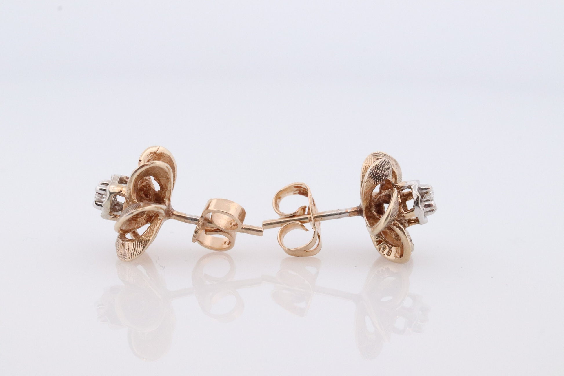 10k Diamond Flower or Star stud earrings. Flower Diamond Solitaire earrings. Propeller Flower Studs.