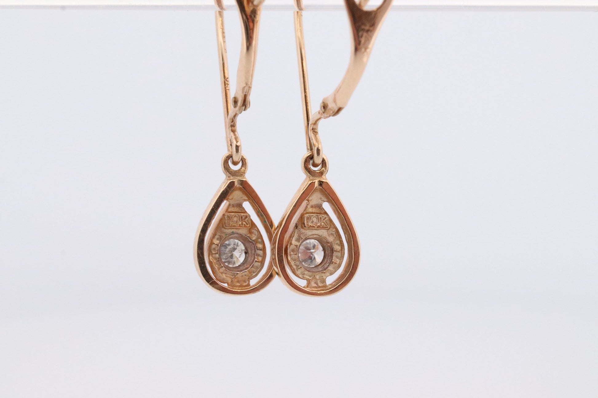 10k Diamond Dangle Earrings. Diamond Drop Teardrop Diamond Dangle earrings. Yellow and White Gold bezel set diamond.