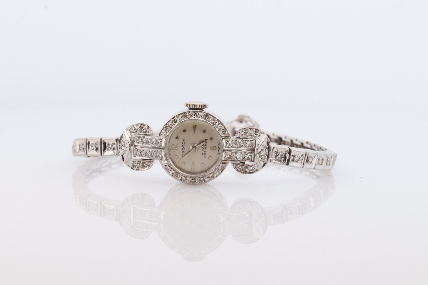 14k CROTON Nivada Grenchen LADIES wrist watch. 14k Manual watch with diamonds.