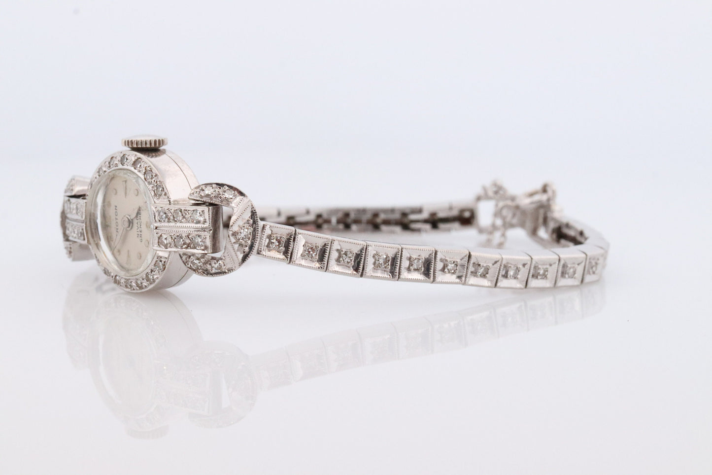 14k CROTON Nivada Grenchen LADIES wrist watch. 14k Manual watch with diamonds.