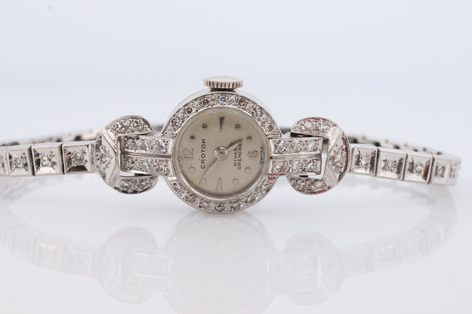 14k CROTON Nivada Grenchen LADIES wrist watch. 14k Manual watch with diamonds.