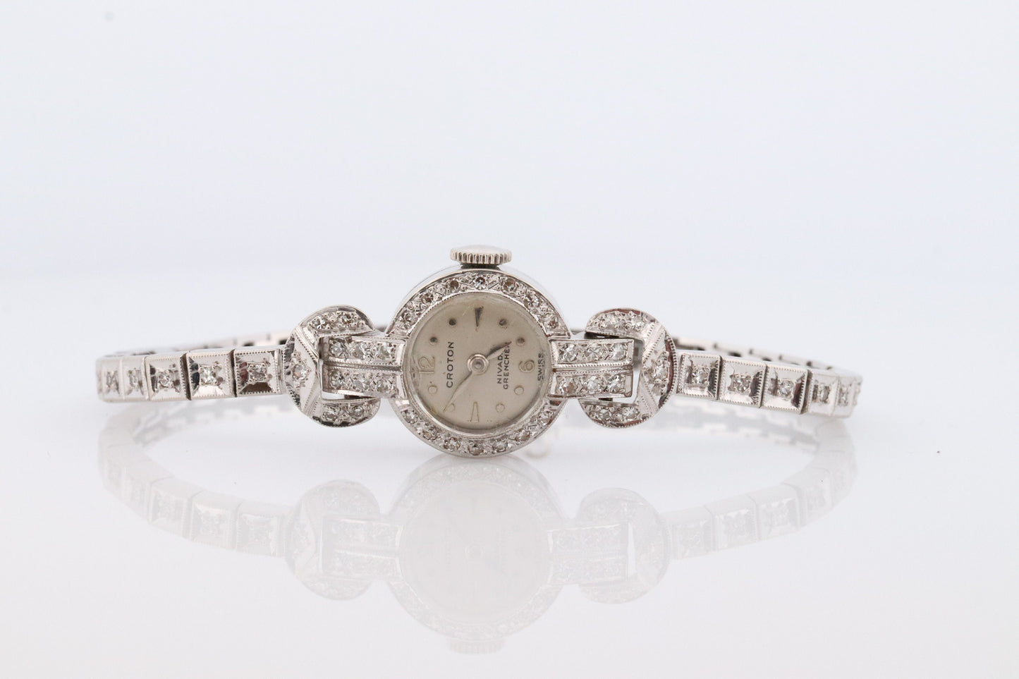 14k CROTON Nivada Grenchen LADIES wrist watch. 14k Manual watch with diamonds.