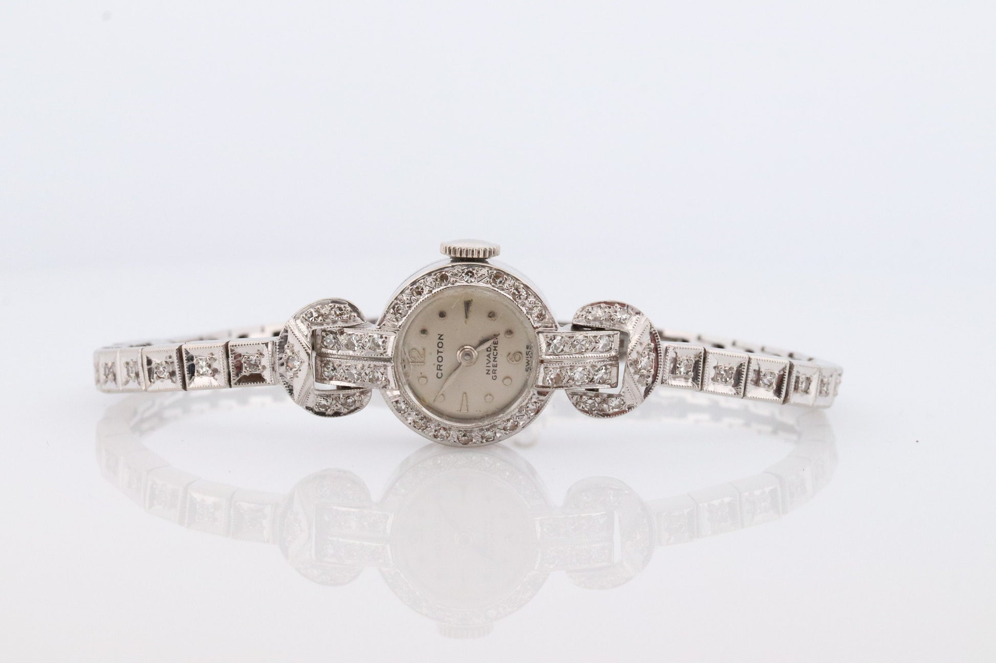 14k CROTON Nivada Grenchen LADIES wrist watch. 14k Manual watch with diamonds.