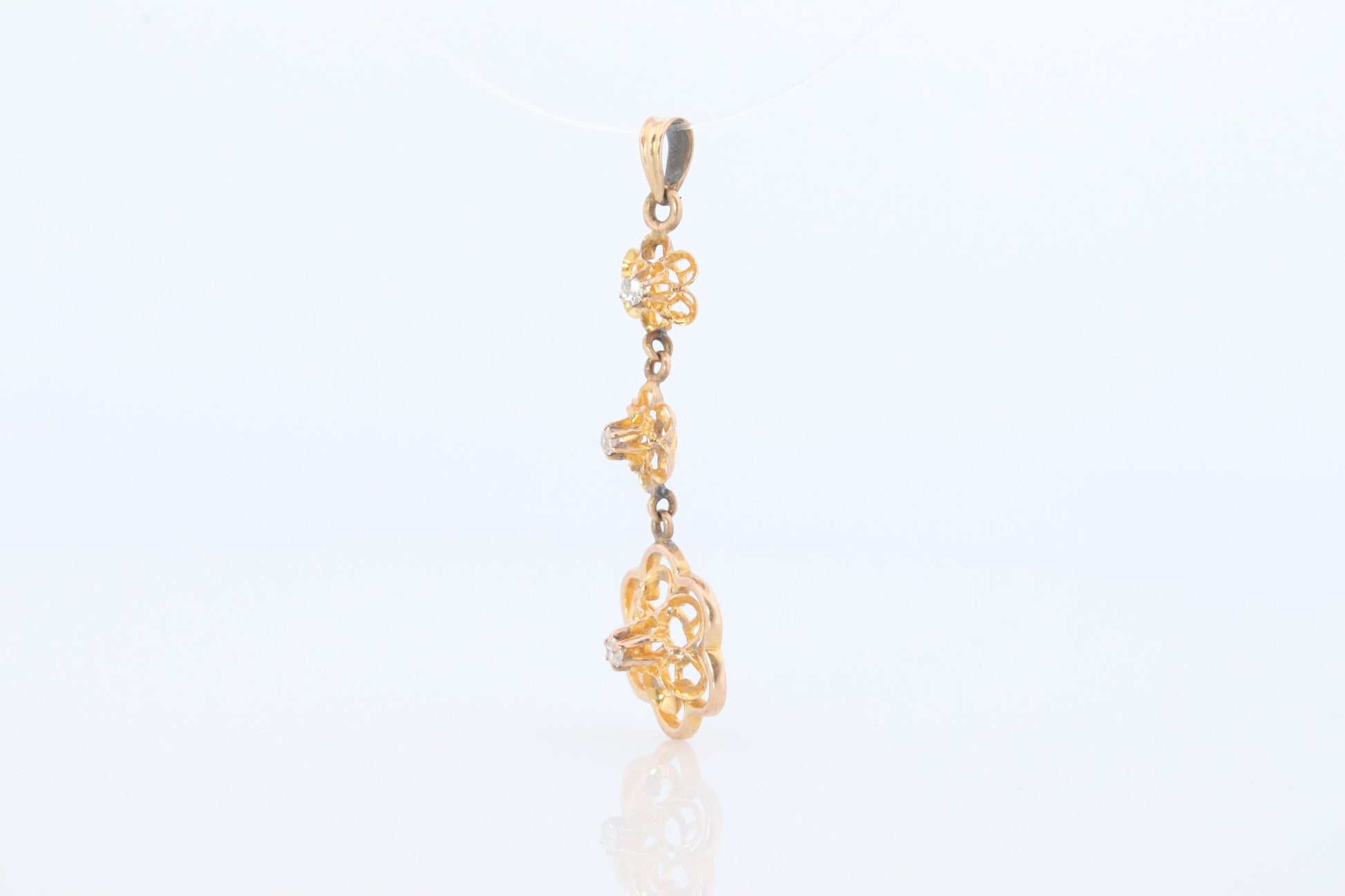 Antique Diamond pendant Buttercup setting. 14k Gold Triple diamond set buttercup. Art nouveau era.
