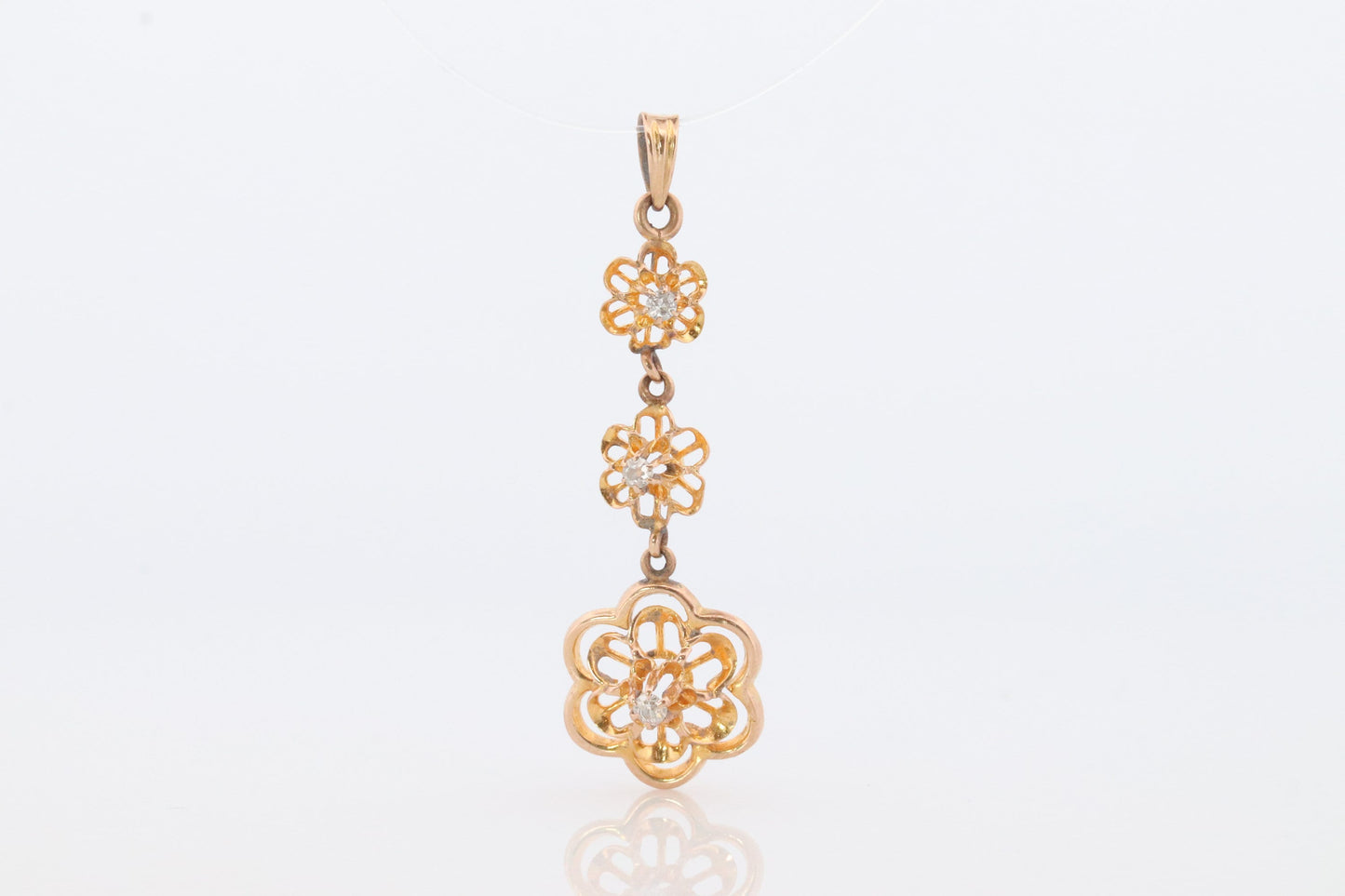 Antique Diamond pendant Buttercup setting. 14k Gold Triple diamond set buttercup. Art nouveau era.