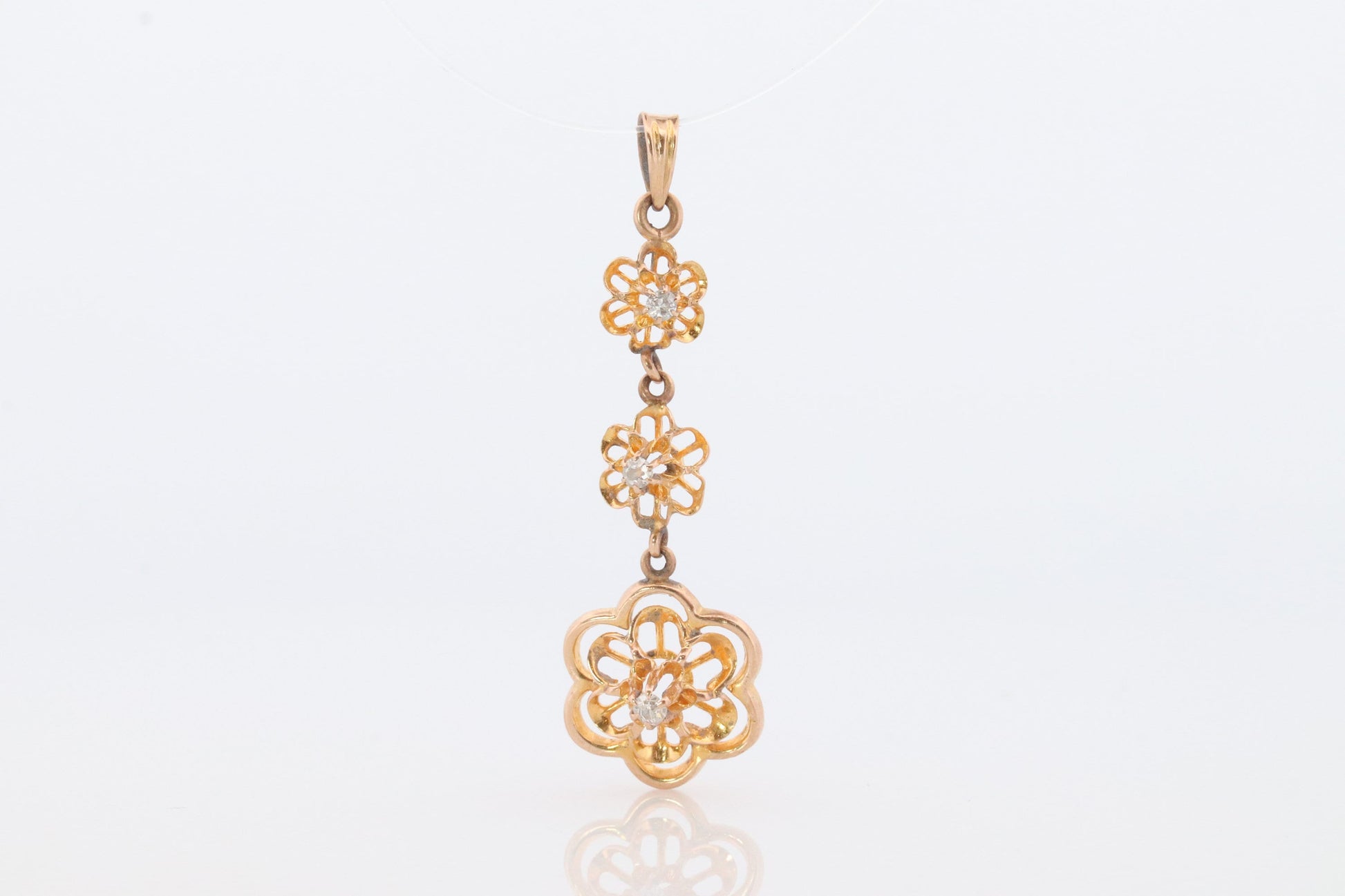Antique Diamond pendant Buttercup setting. 14k Gold Triple diamond set buttercup. Art nouveau era.