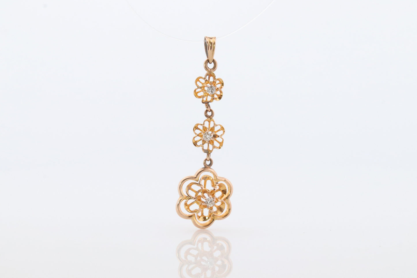 Antique Diamond pendant Buttercup setting. 14k Gold Triple diamond set buttercup. Art nouveau era.