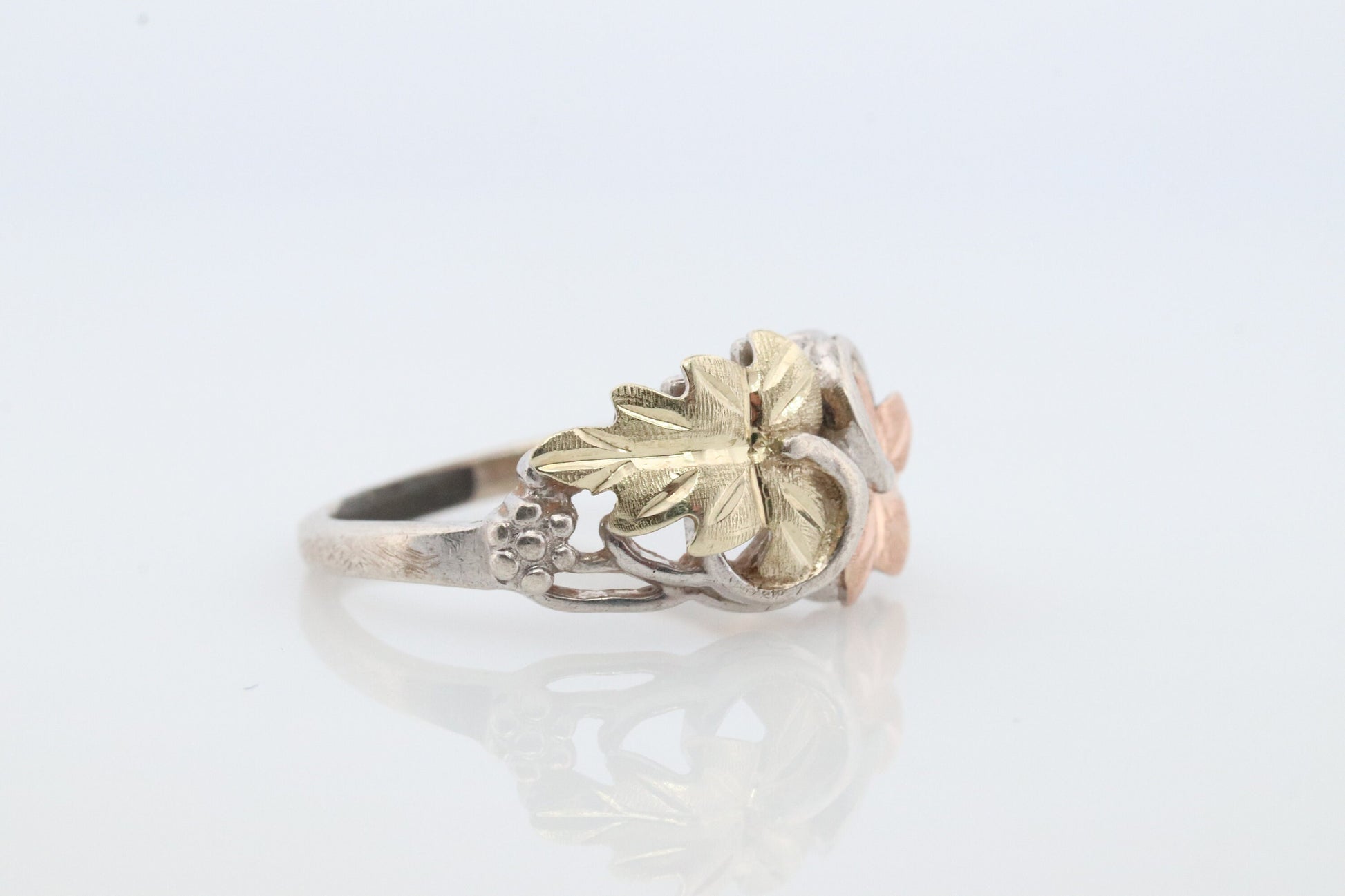 Black Hills Gold ring. 925 Sterling Silver and 12k Black Hills Gold inlay band. Dainty ring.