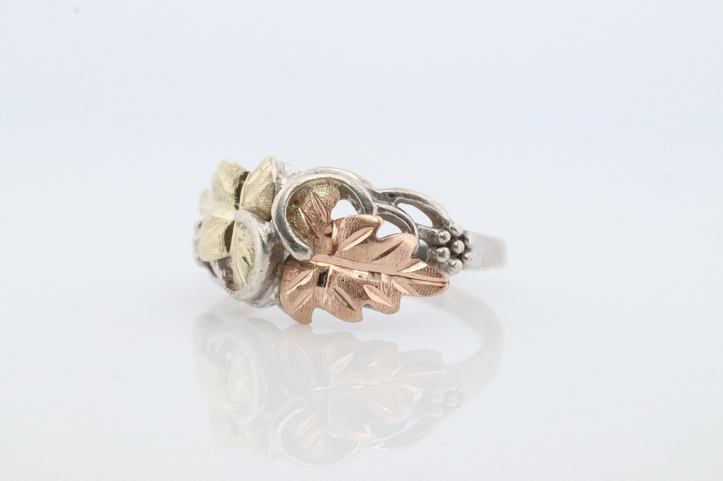 Black Hills Gold ring. 925 Sterling Silver and 12k Black Hills Gold inlay band. Dainty ring.
