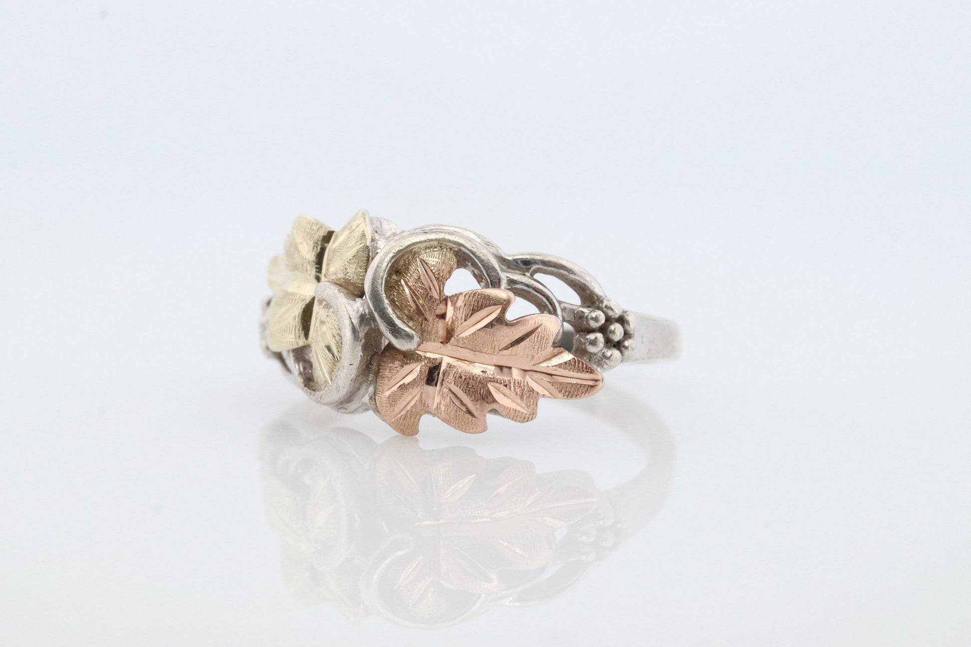 Black Hills Gold ring. 925 Sterling Silver and 12k Black Hills Gold inlay band. Dainty ring.