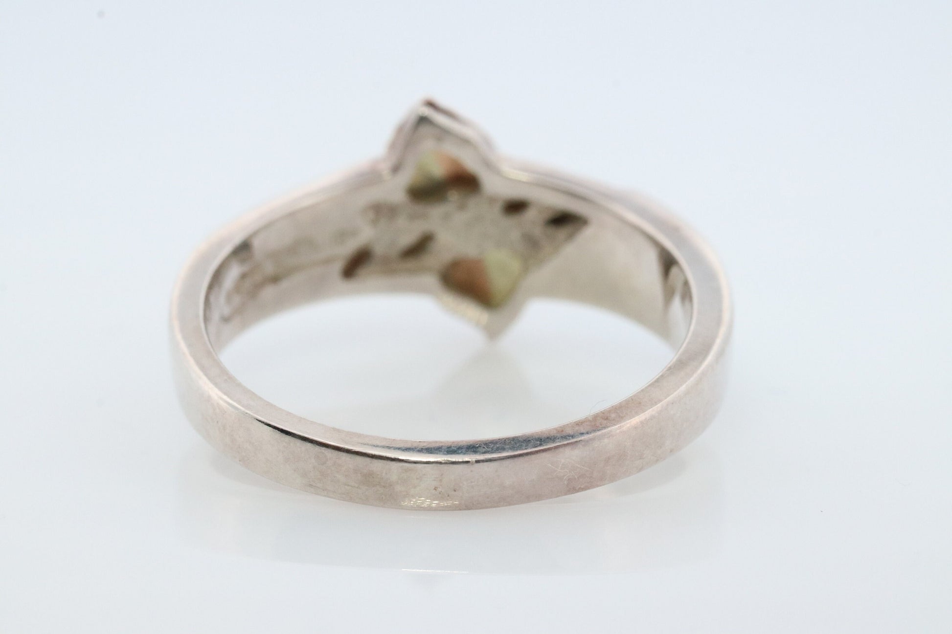 Black Hills Gold Turquoise Ring. Sterling Silver and 10k/12k Gold Leaves. Crushed Turquoise inlay.