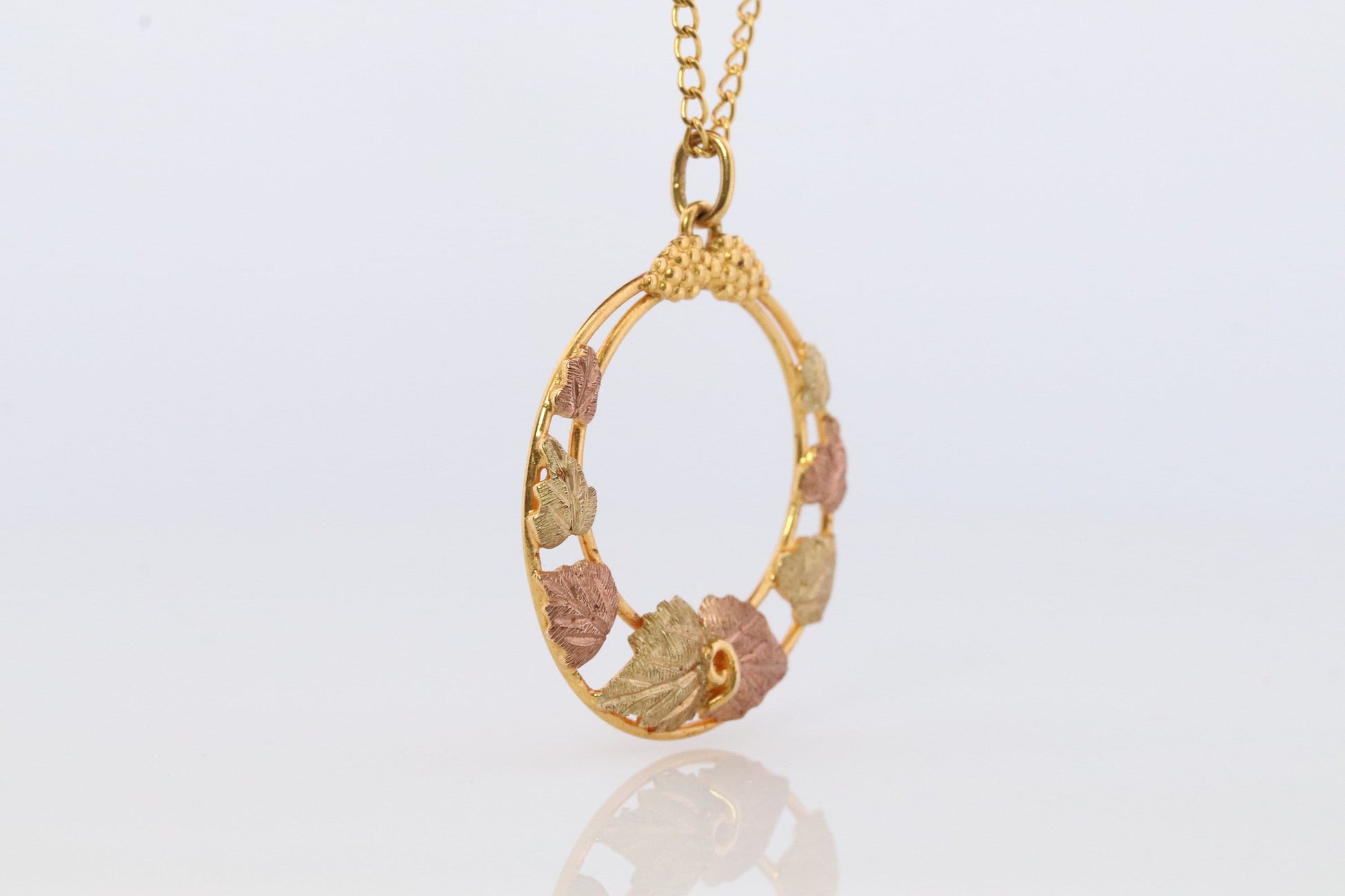 Black Hills Gold Pendant Necklace. 10k 12k Black Hills Gold Wreath Round Pendant.