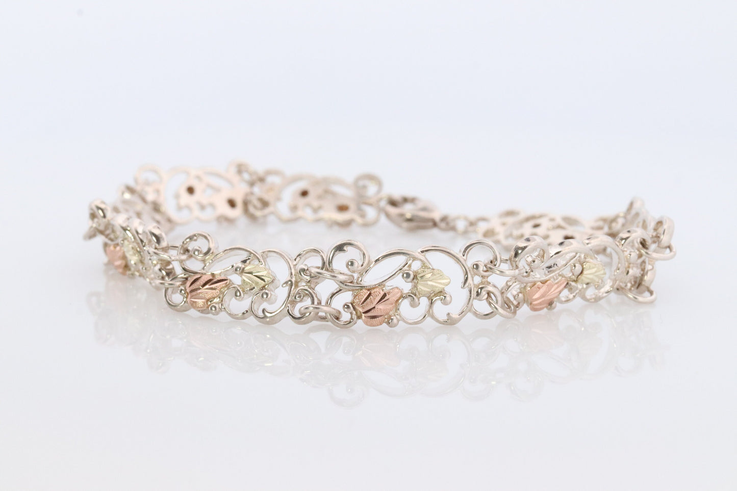 Black Hills Gold Bracelet. STERLING SILVER with 10k Multi-Tone Black Hills Gold Bracelet. Intricate Floral Vine Bracelet.