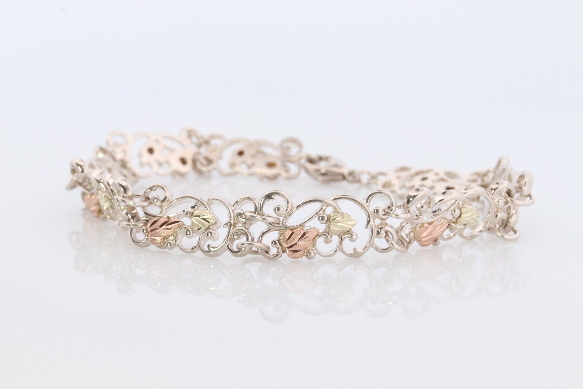 Black Hills Gold Bracelet. STERLING SILVER with 10k Multi-Tone Black Hills Gold Bracelet. Intricate Floral Vine Bracelet.