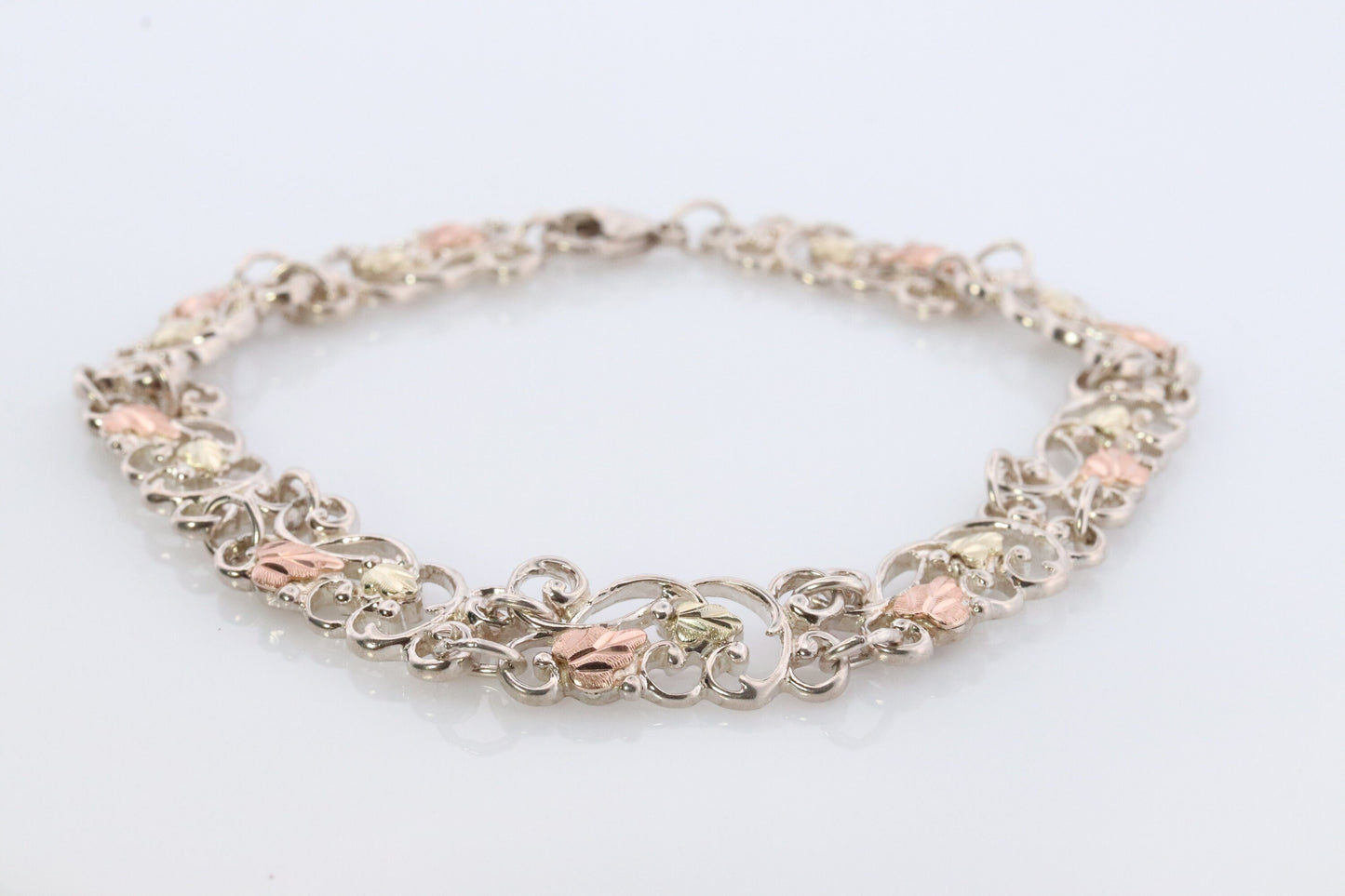 Black Hills Gold Bracelet. STERLING SILVER with 10k Multi-Tone Black Hills Gold Bracelet. Intricate Floral Vine Bracelet.