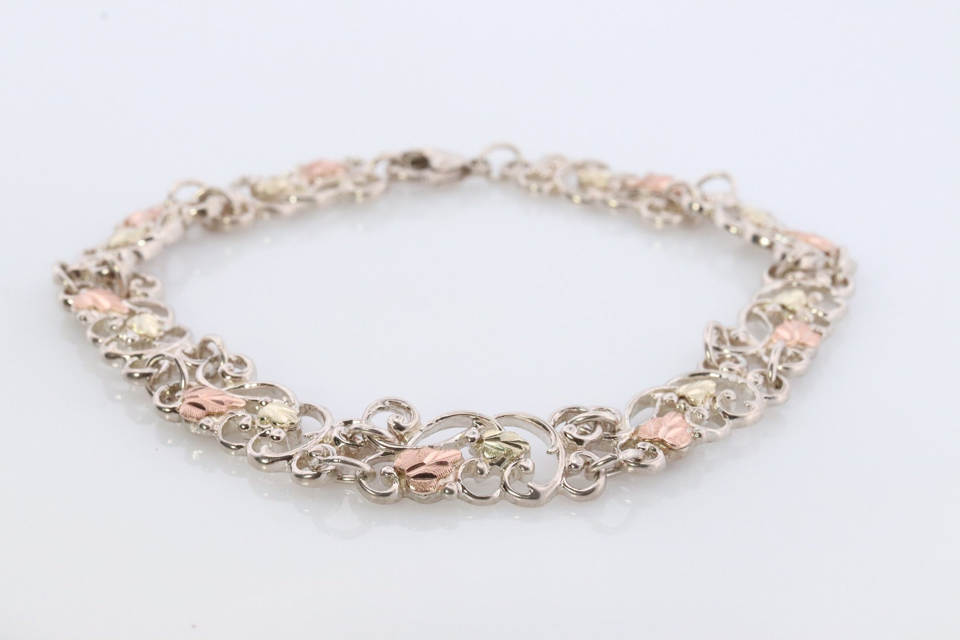 Black Hills Gold Bracelet. STERLING SILVER with 10k Multi-Tone Black Hills Gold Bracelet. Intricate Floral Vine Bracelet.