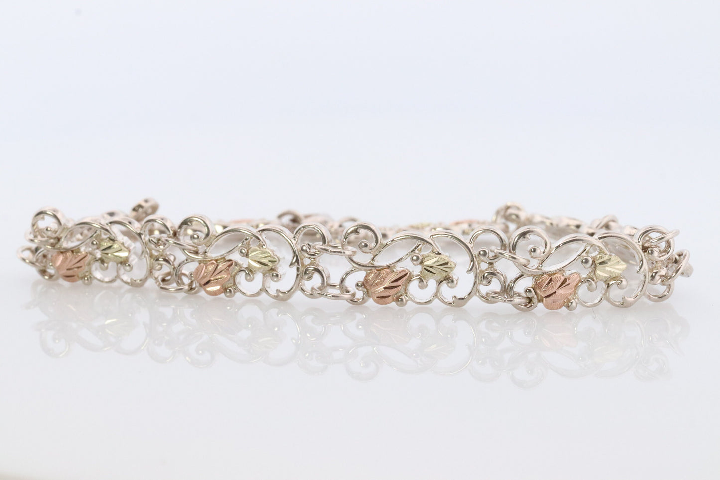 Black Hills Gold Bracelet. STERLING SILVER with 10k Multi-Tone Black Hills Gold Bracelet. Intricate Floral Vine Bracelet.