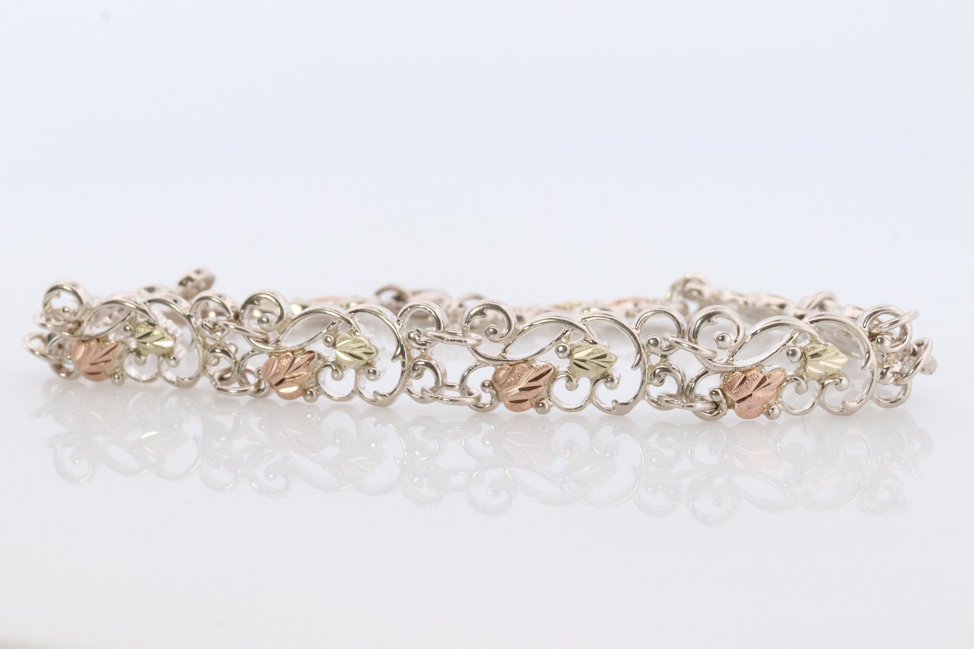 Black Hills Gold Bracelet. STERLING SILVER with 10k Multi-Tone Black Hills Gold Bracelet. Intricate Floral Vine Bracelet.