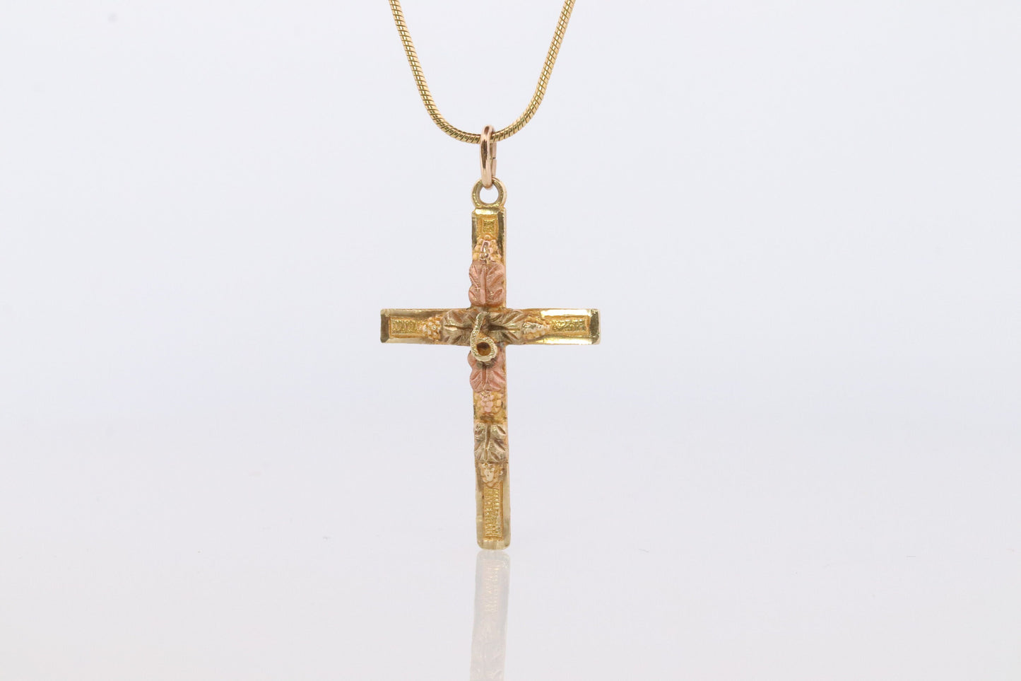 Black Hills Gold Cross Necklace. 10k multi tone Black Hills Gold Crucifix Pendant