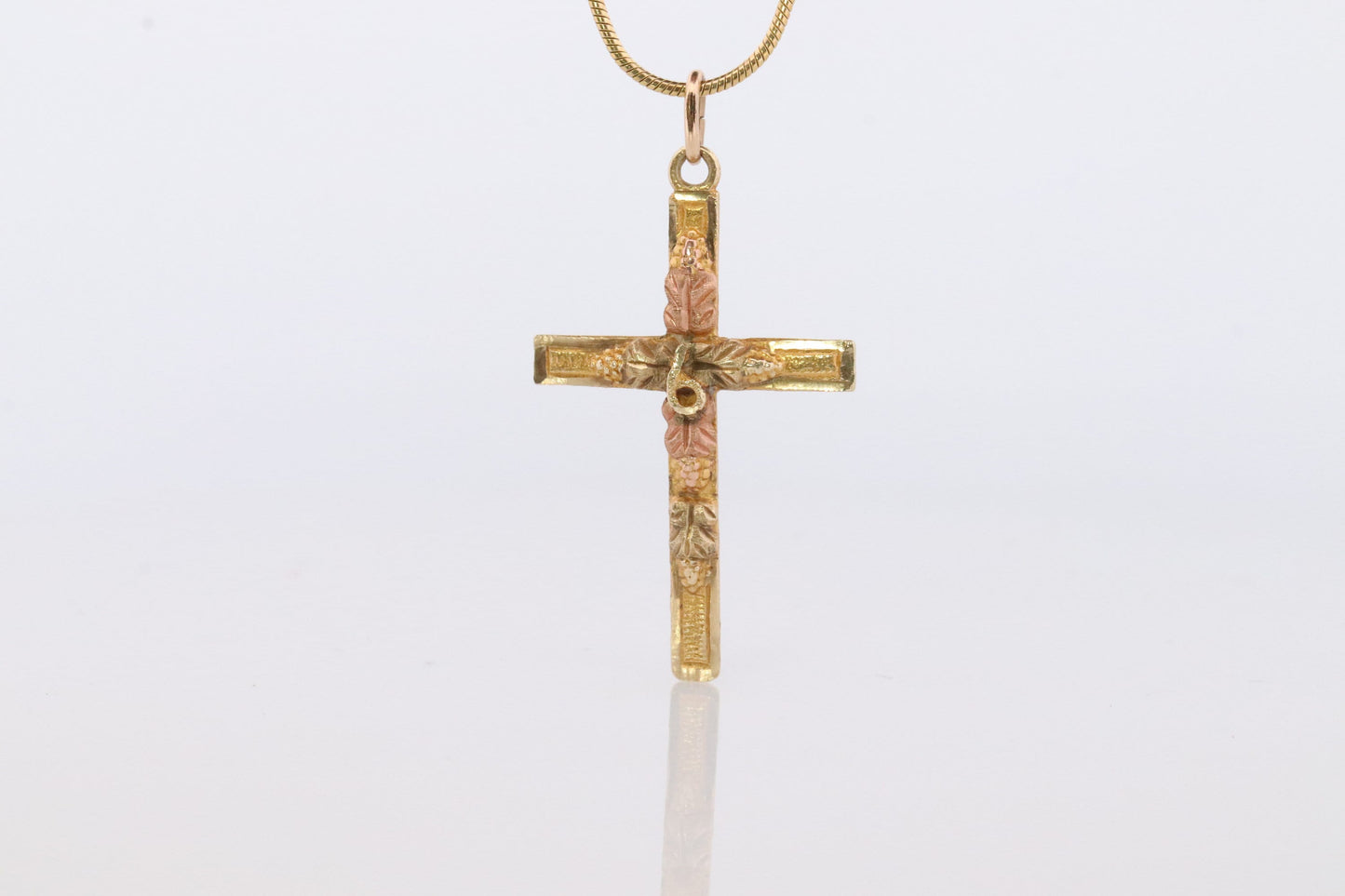 Black Hills Gold Cross Necklace. 10k multi tone Black Hills Gold Crucifix Pendant