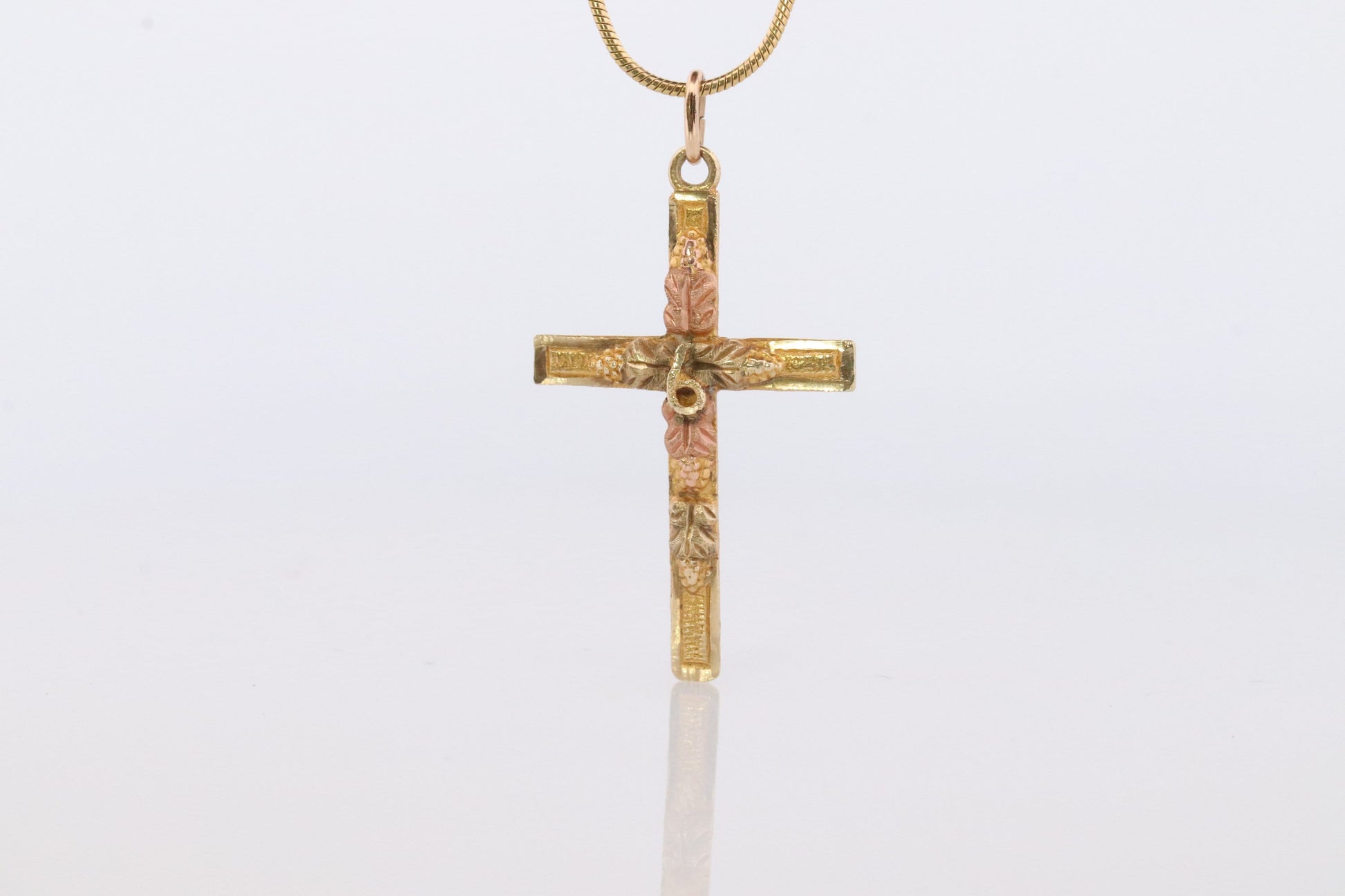 Black Hills Gold Cross Necklace. 10k multi tone Black Hills Gold Crucifix Pendant