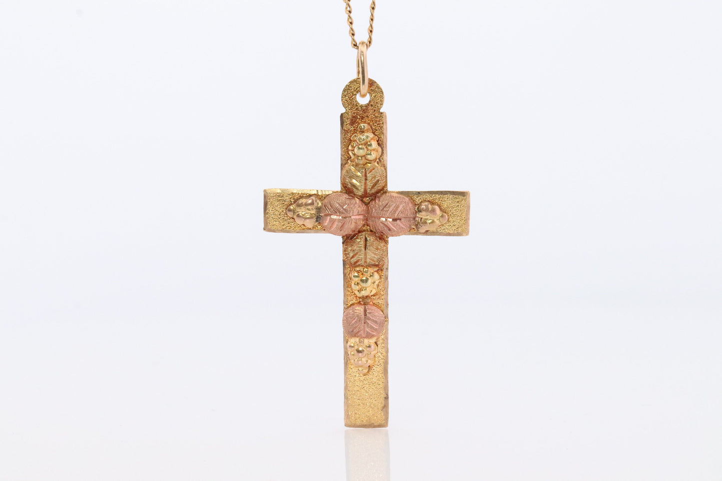 Black Hills Gold Cross Necklace. 10k multi tone Black Hills Gold Crucifix Pendant