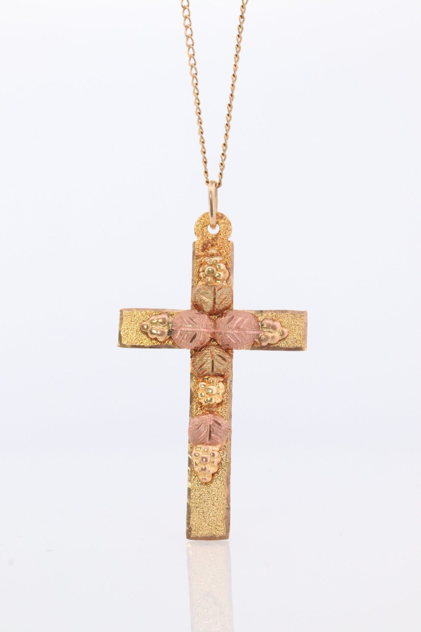 Black Hills Gold Cross Necklace. 10k multi tone Black Hills Gold Crucifix Pendant