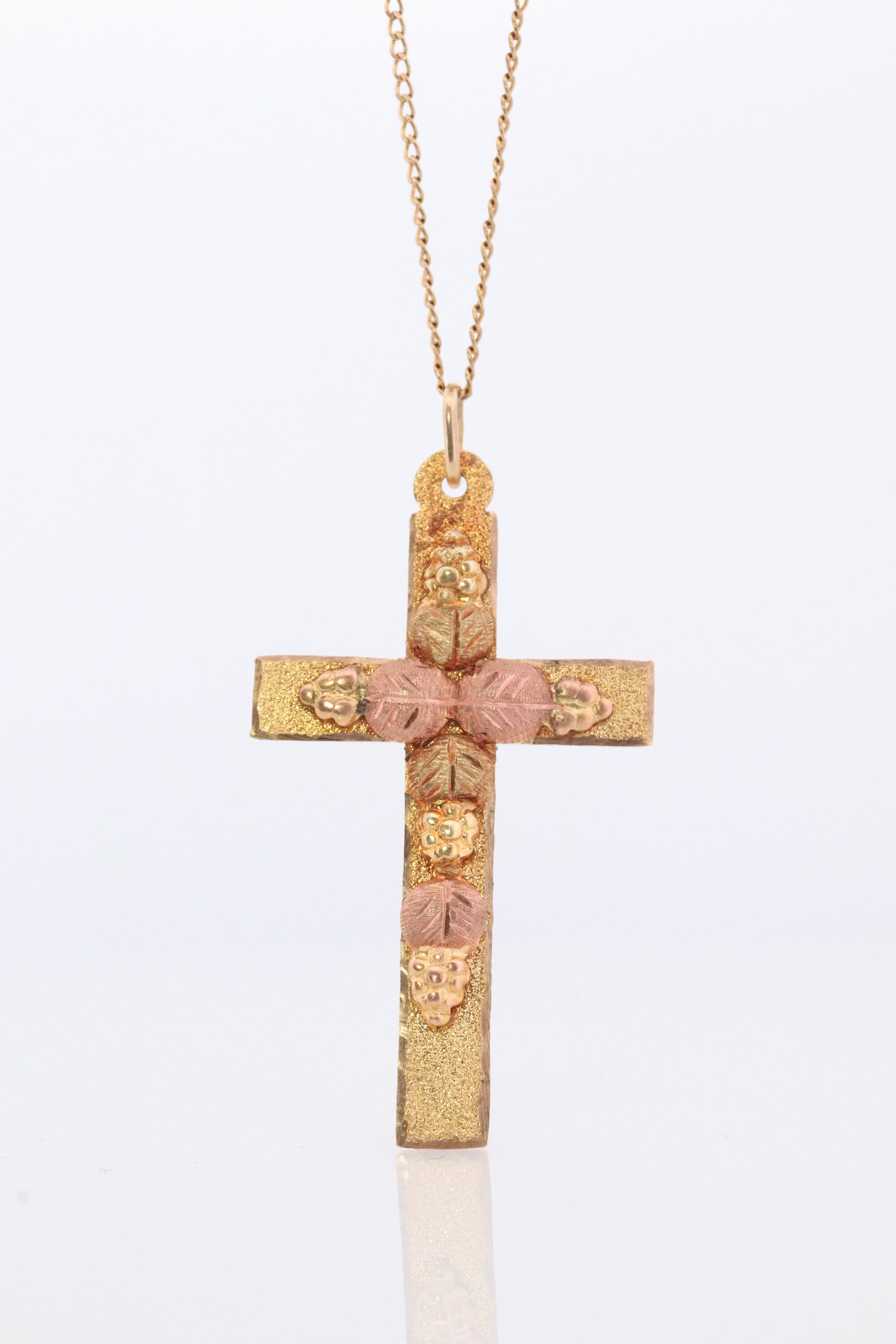 Black Hills Gold Cross Necklace. 10k multi tone Black Hills Gold Crucifix Pendant