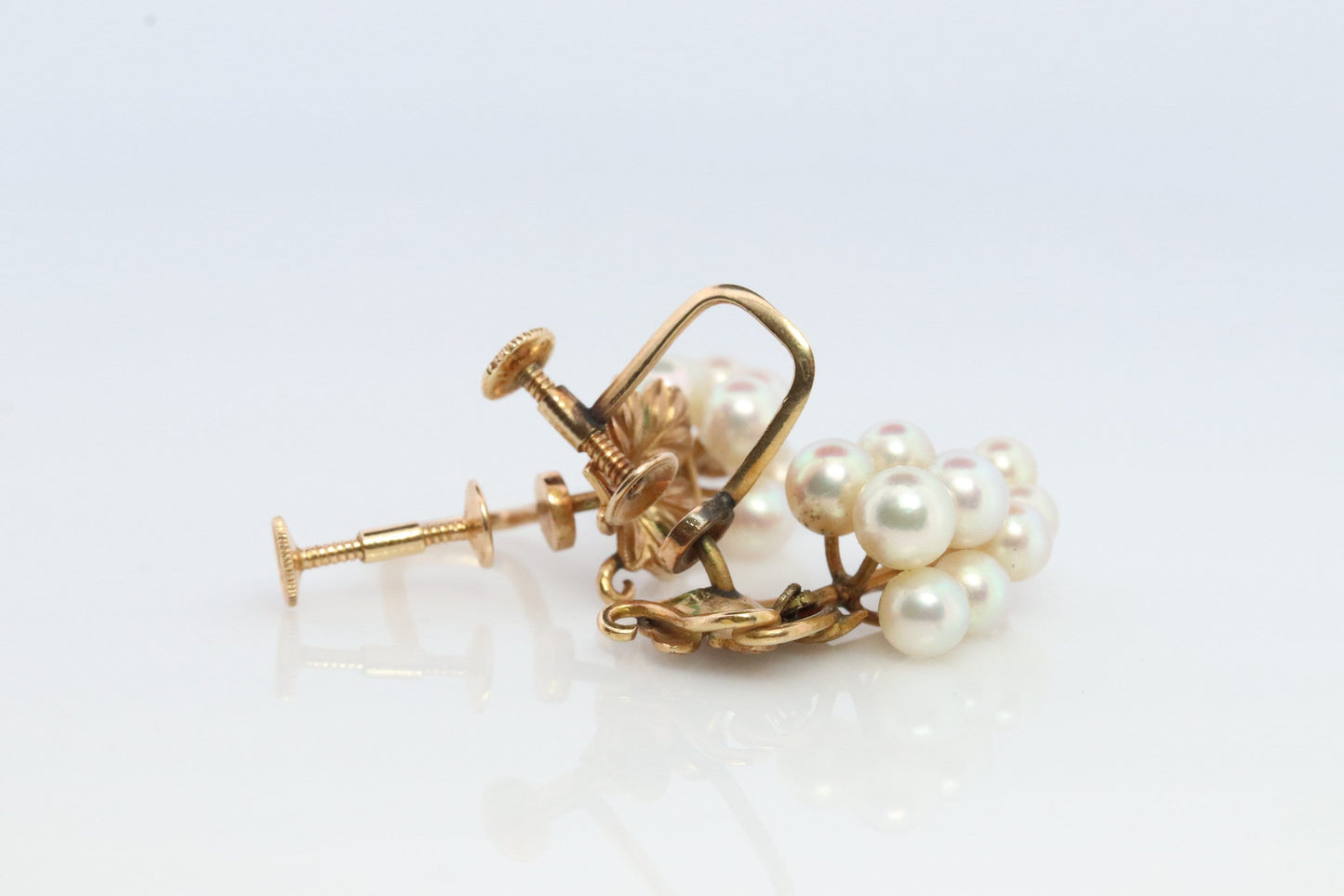 14k MIKIMOTO earrings. Vintage Mikimoto Akoya pearl screw back earrings. Grape vine bunch leaf unpierced clip earrings.