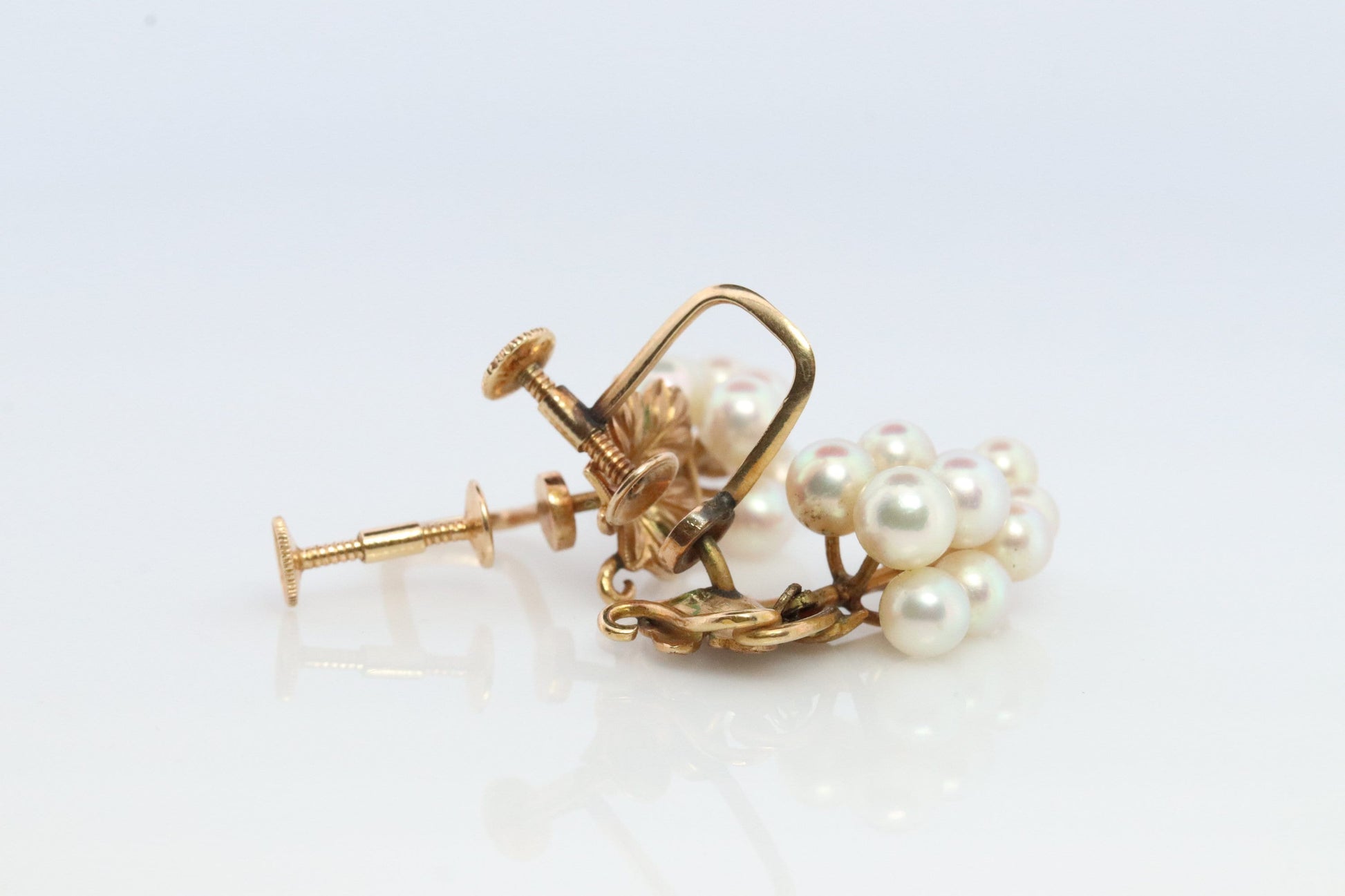 14k MIKIMOTO earrings. Vintage Mikimoto Akoya pearl screw back earrings. Grape vine bunch leaf unpierced clip earrings.
