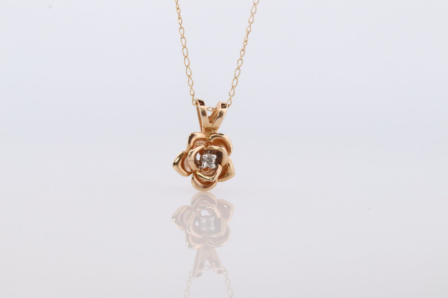 14k Diamond Rose Flower Pendant. 14k Diamond Daisy Rose flower pendant and necklace. Dainty diamond solitaire pendant