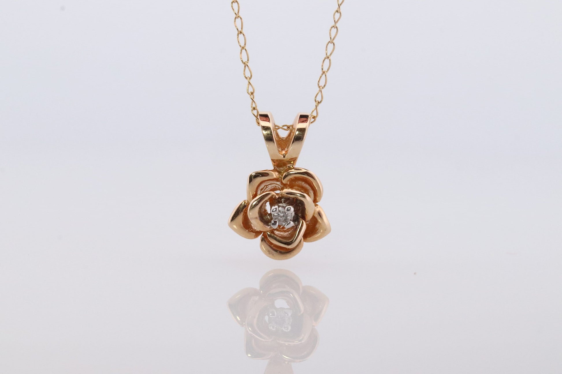14k Diamond Rose Flower Pendant. 14k Diamond Daisy Rose flower pendant and necklace. Dainty diamond solitaire pendant