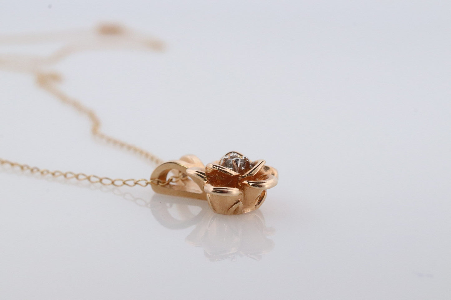 14k Diamond Rose Flower Pendant. 14k Diamond Daisy Rose flower pendant and necklace. Dainty diamond solitaire pendant