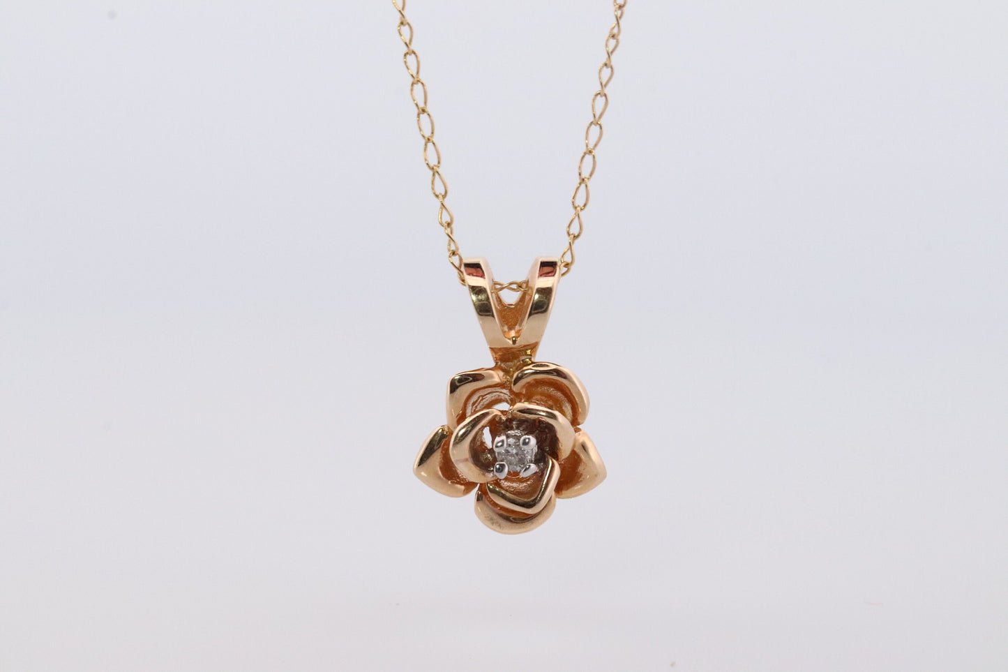 14k Diamond Rose Flower Pendant. 14k Diamond Daisy Rose flower pendant and necklace. Dainty diamond solitaire pendant