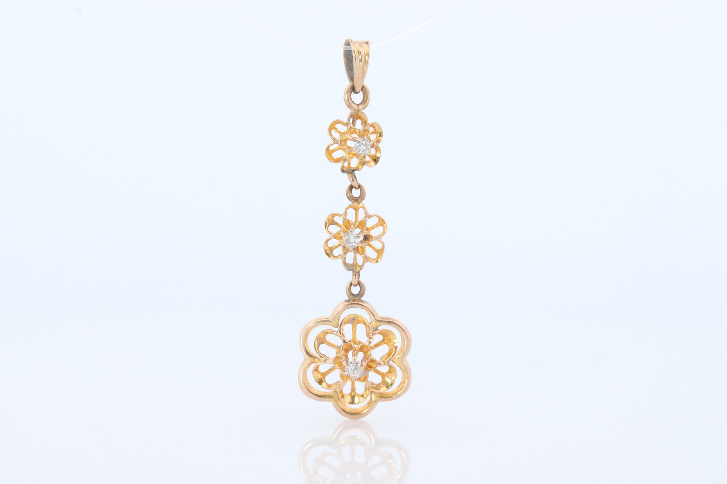 Antique Diamond pendant Buttercup setting. 14k Gold Triple diamond set buttercup. Art nouveau era.