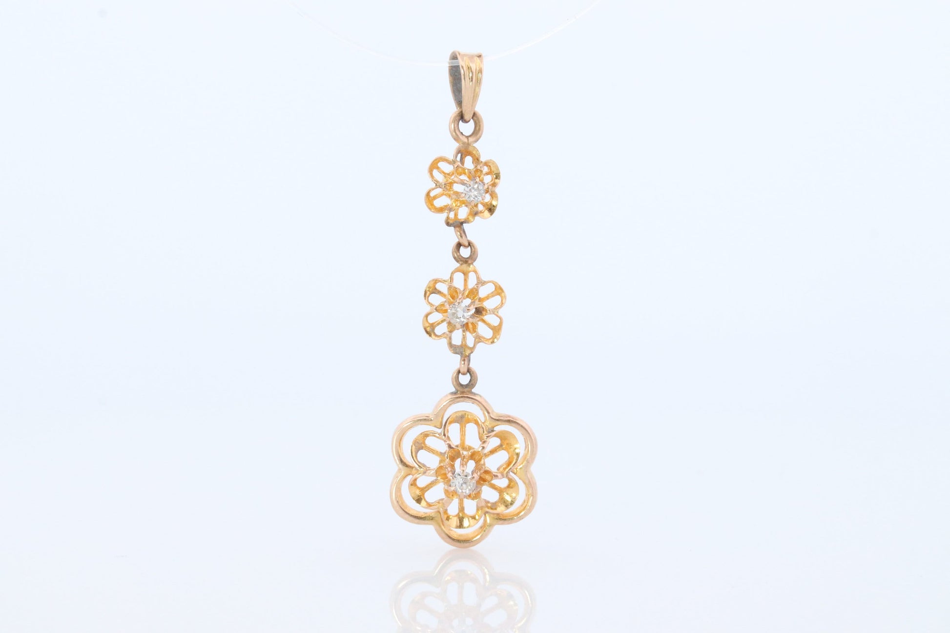 Antique Diamond pendant Buttercup setting. 14k Gold Triple diamond set buttercup. Art nouveau era.