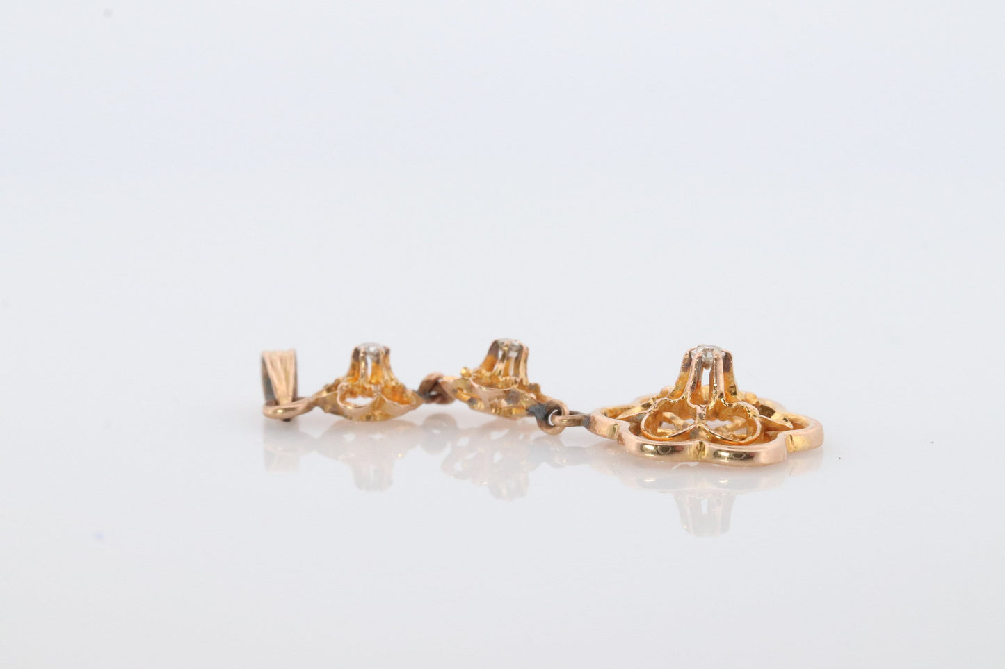 Antique Diamond pendant Buttercup setting. 14k Gold Triple diamond set buttercup. Art nouveau era.