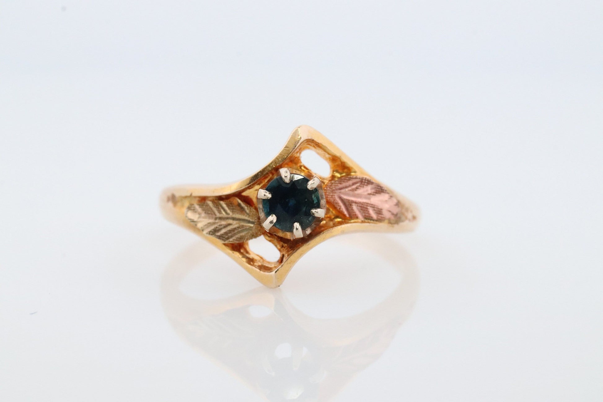 Black Hills Gold Ring. Sapphire Bypass band. Round Blue Sapphire 10k Multi-Tone Black Hills Gold Statement Ring.