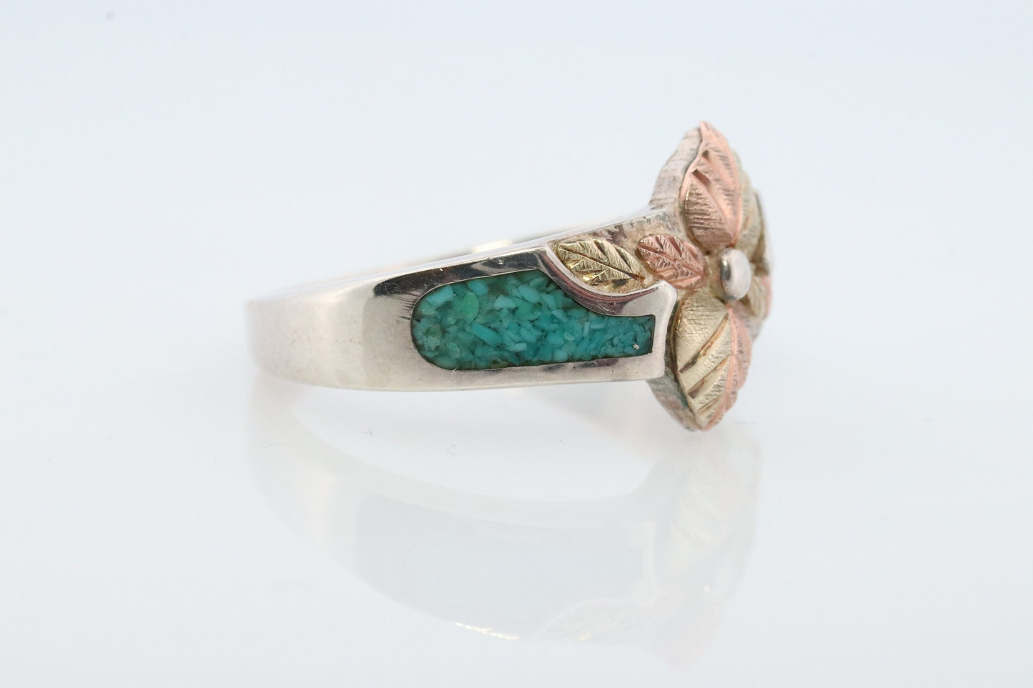 Black Hills Gold Turquoise Ring. Sterling Silver and 10k/12k Gold Leaves. Crushed Turquoise inlay.