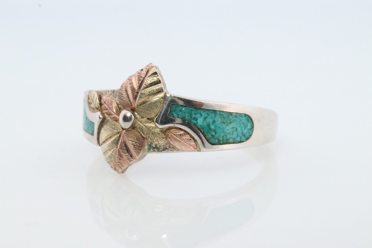 Black Hills Gold Turquoise Ring. Sterling Silver and 10k/12k Gold Leaves. Crushed Turquoise inlay.