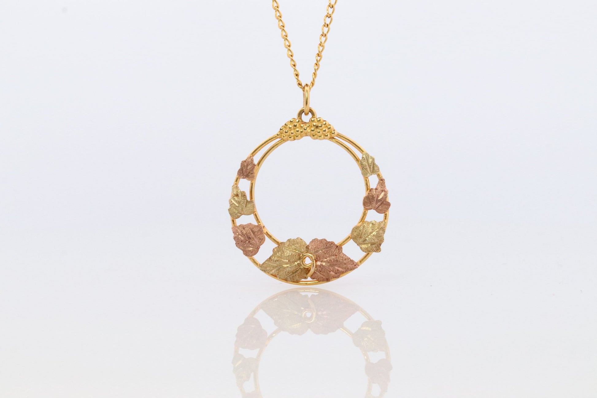 Black Hills Gold Pendant Necklace. 10k 12k Black Hills Gold Wreath Round Pendant.