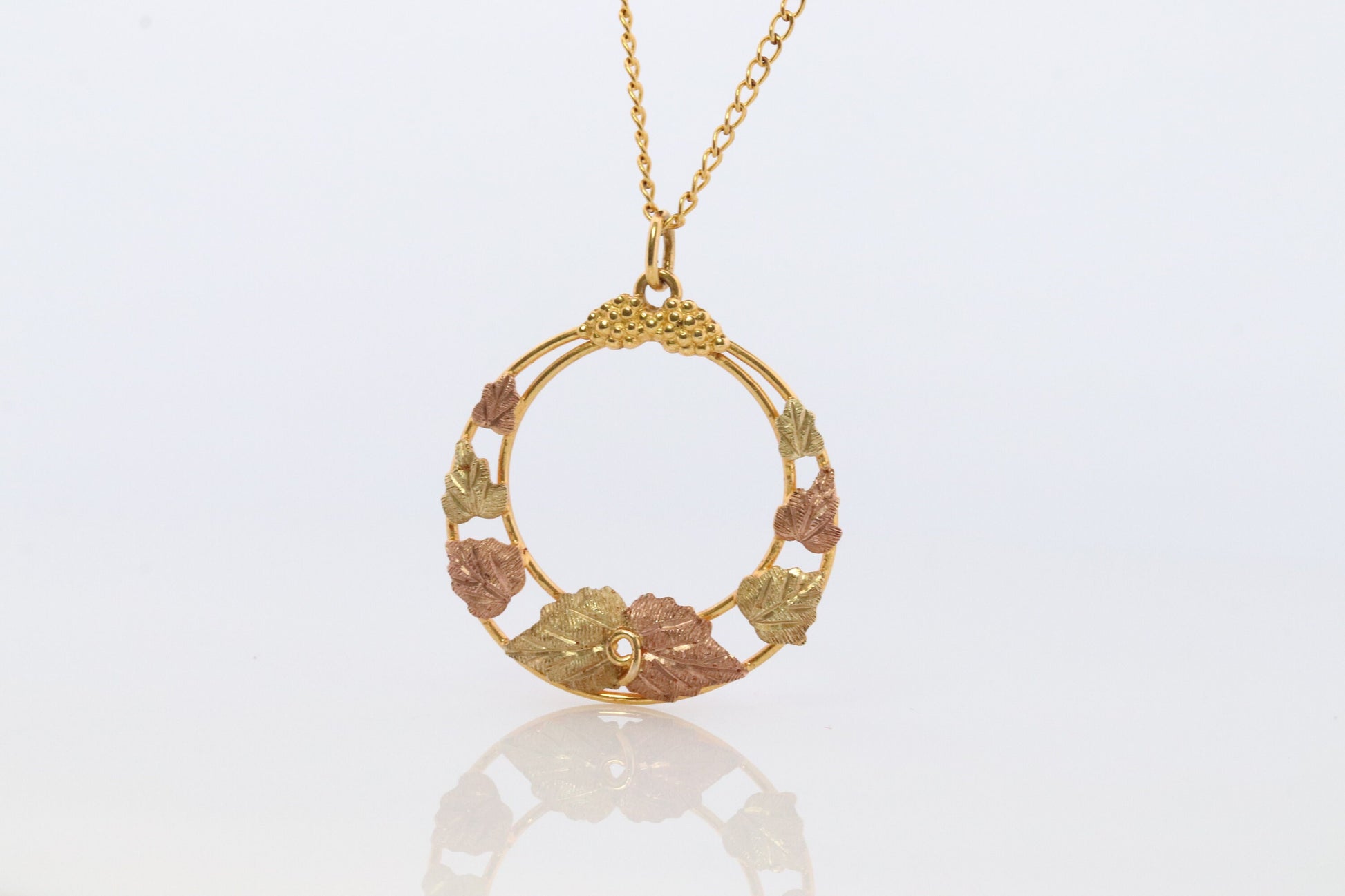 Black Hills Gold Pendant Necklace. 10k 12k Black Hills Gold Wreath Round Pendant.