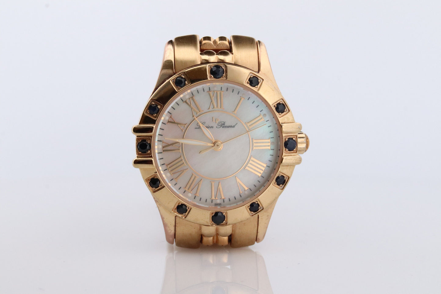 Lucien Piccard watch Ladies. Stainless Steel Gold Tone with Sapphires and MOP Face. Women's Lucien Piccard watch.