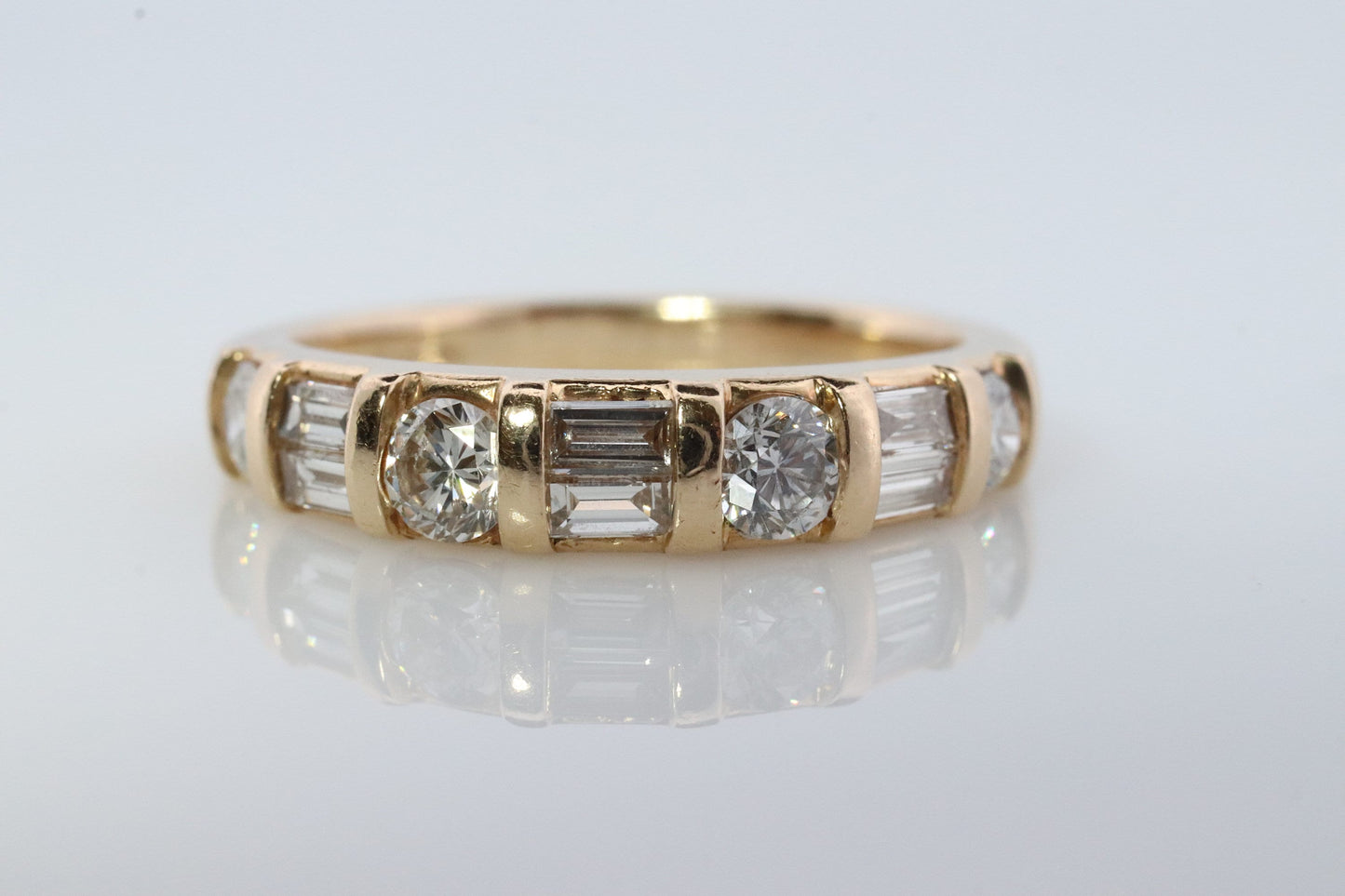 Diamond Band. 14k Yellow Gold with round and Baguette diamonds channel set cluster. 1ctw