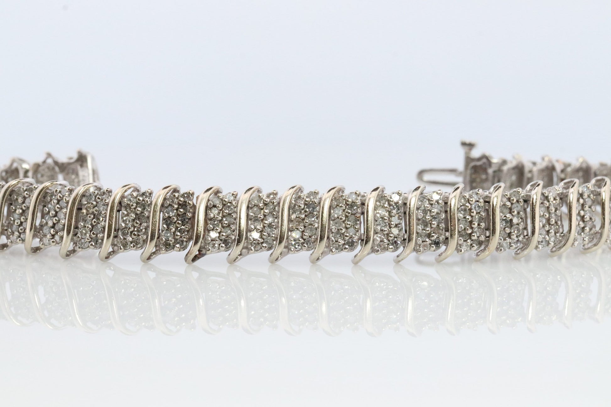 10k Diamond Tennis Bracelet. 10k S-LINK round diamond cluster Tennis bracelet. 2CTW JAFA wide tennis bracelet.