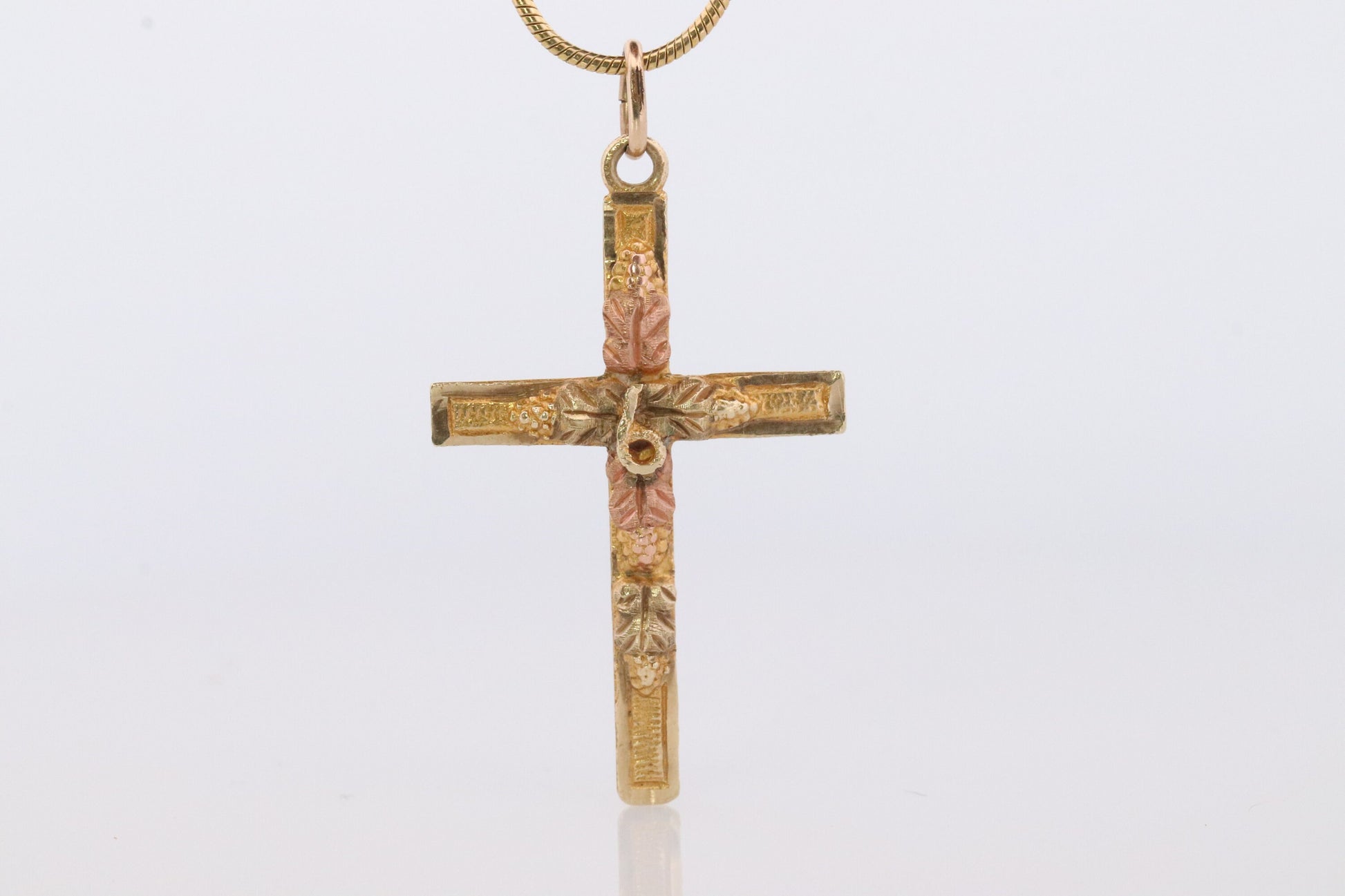 Black Hills Gold Cross Necklace. 10k multi tone Black Hills Gold Crucifix Pendant