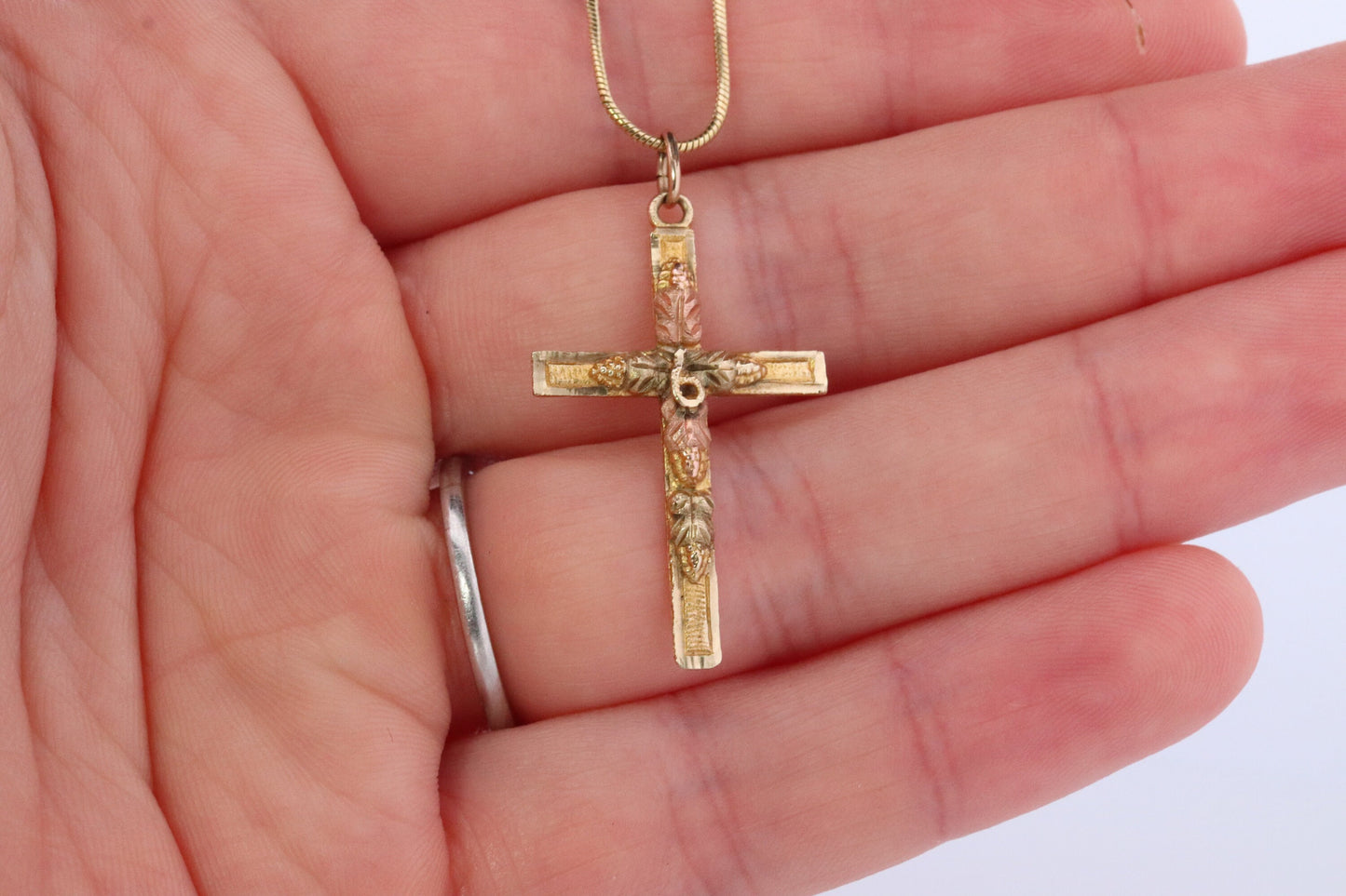 Black Hills Gold Cross Necklace. 10k multi tone Black Hills Gold Crucifix Pendant