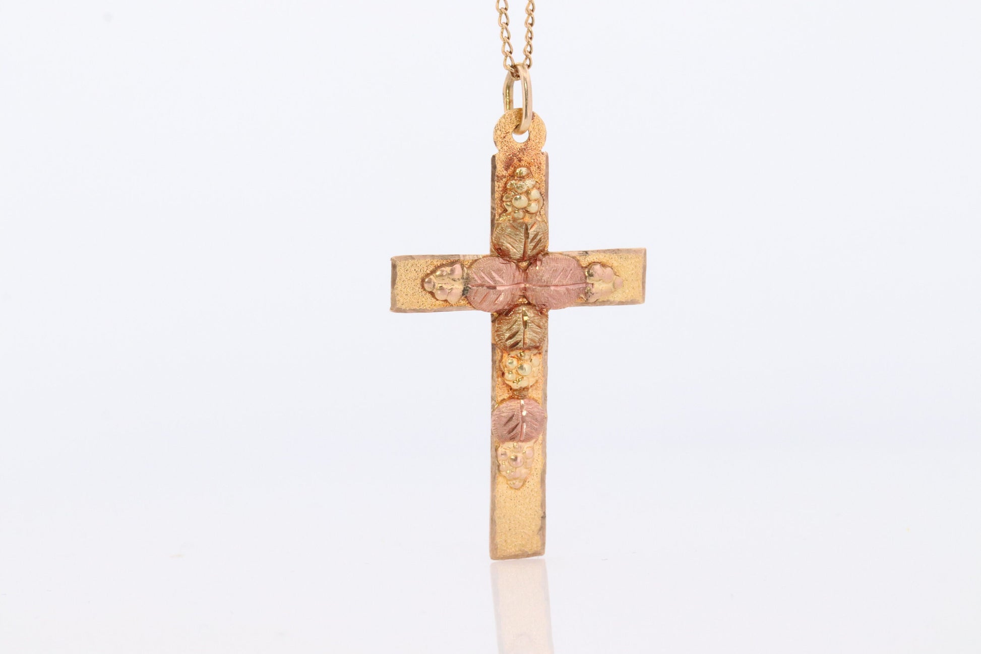 Black Hills Gold Cross Necklace. 10k multi tone Black Hills Gold Crucifix Pendant