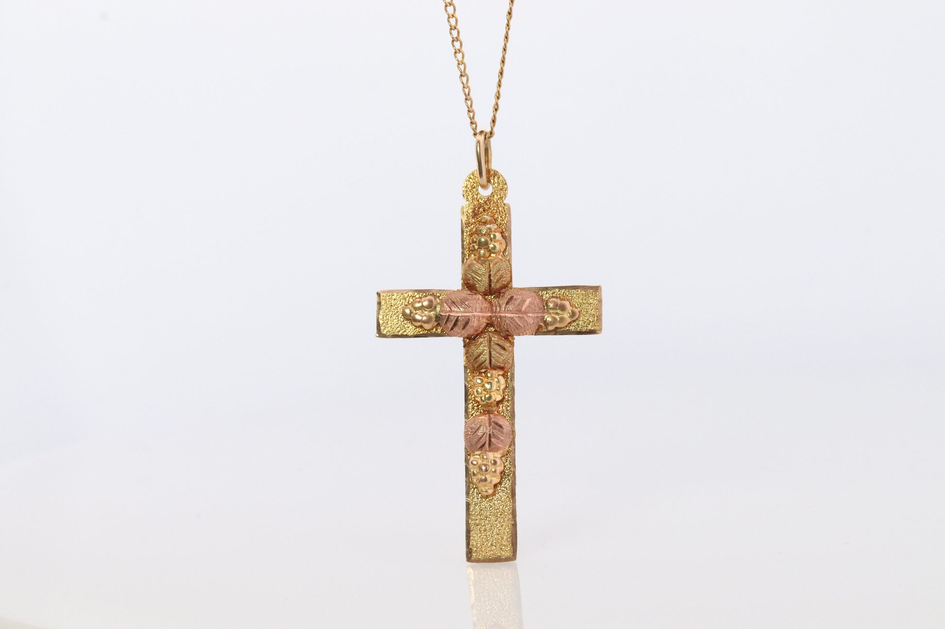 Black Hills Gold Cross Necklace. 10k multi tone Black Hills Gold Crucifix Pendant
